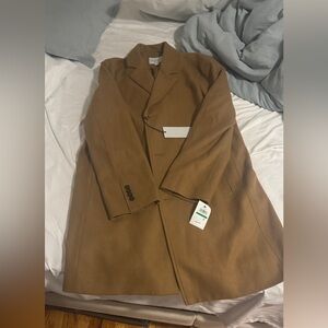 Cole Haan size LARGE 
Men’s coat 
Never worn